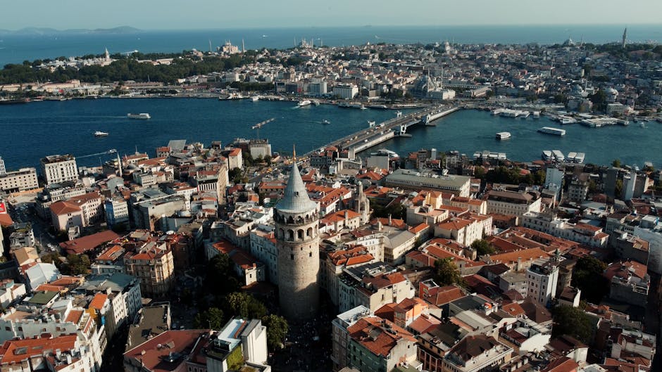 A stunning aerial view capturing Istanbul's Galata Tower and historic cityscape by the Bosphorus.
