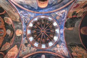 Detailed ceiling artwork in Kariye Camii, Istanbul, showcasing vibrant religious frescoes.
