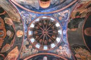 Detailed ceiling artwork in Kariye Camii, Istanbul, showcasing vibrant religious frescoes.