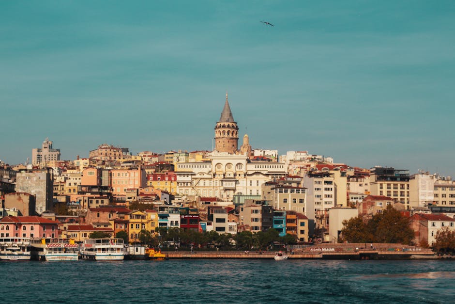 Beautiful view of Galata Tower and vibrant Istanbul skyline by the Bosphorus.