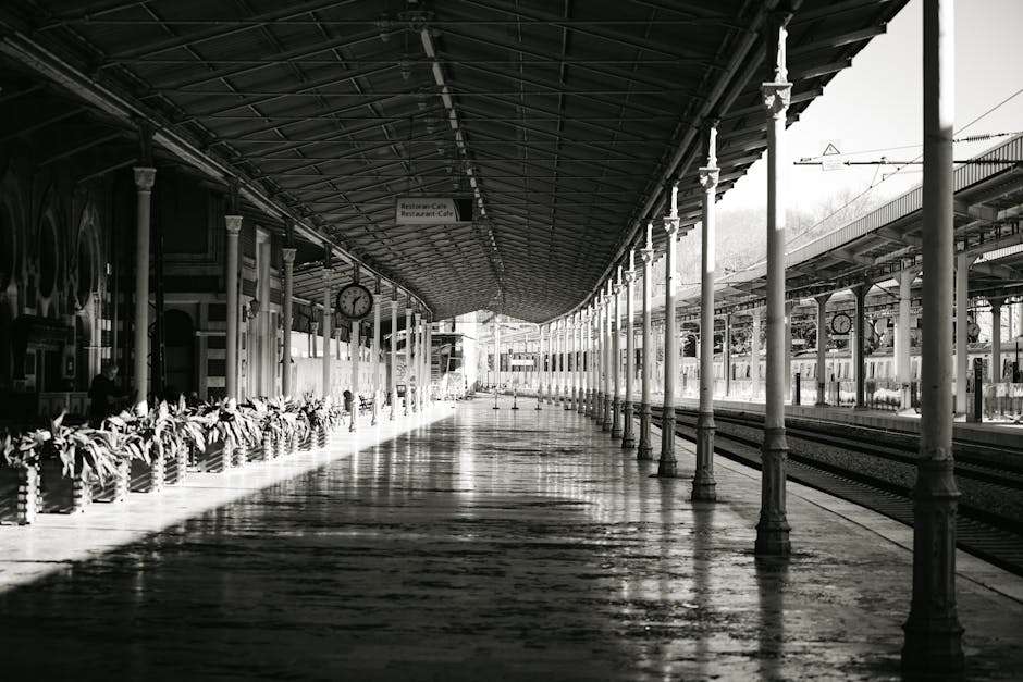 Black and white view of historic Sirkeci train station platform in Istanbul.