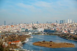 Aerial view of Istanbul's skyline with the Golden Horn river, capturing the blend of old and new architecture.