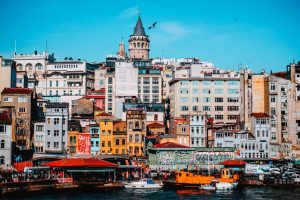 Vibrant view of Istanbul's Galata district with historic architecture and city life.