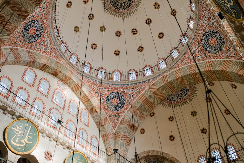 Intricate frescoes and architecture of Kılıç Ali Pasha Mosque in Istanbul, showcasing Ottoman style.